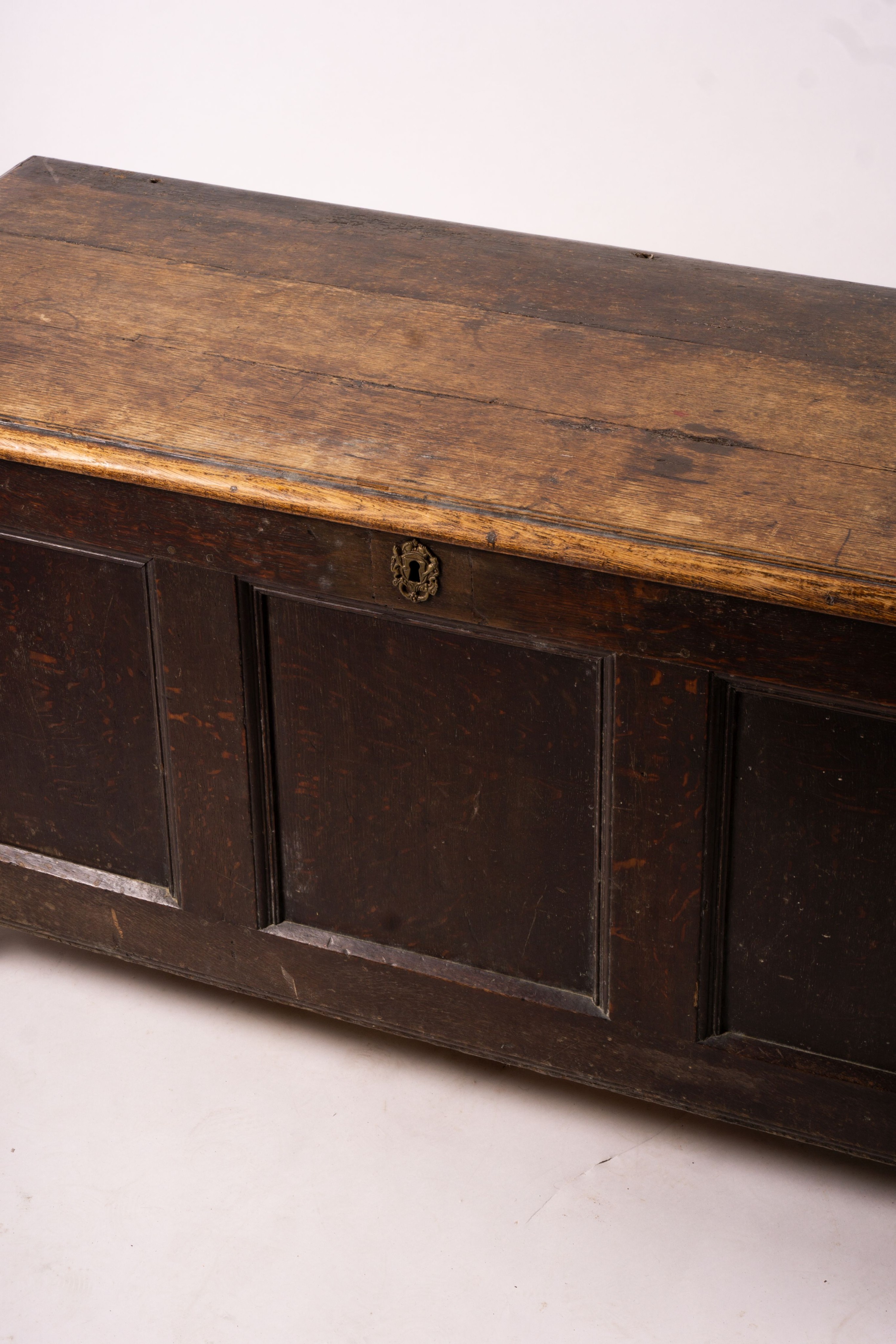 A 17th century panelled oak coffer, length 136cm, depth 56cm, height 64cm